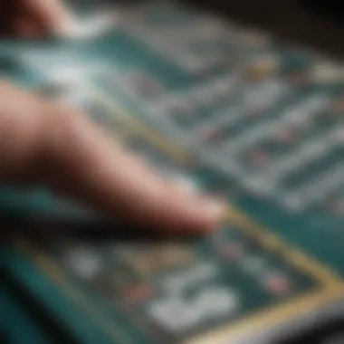 Close-up view of a person scratching a scratchcard